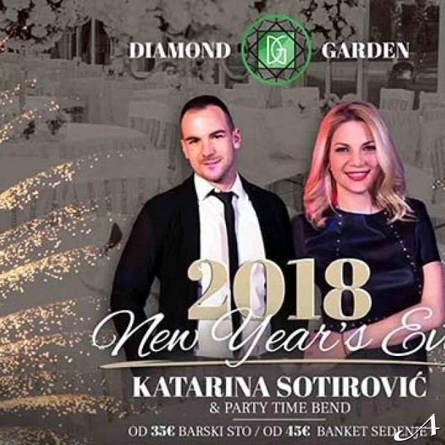 Doček Nove godine - par u elegantnoj odeći