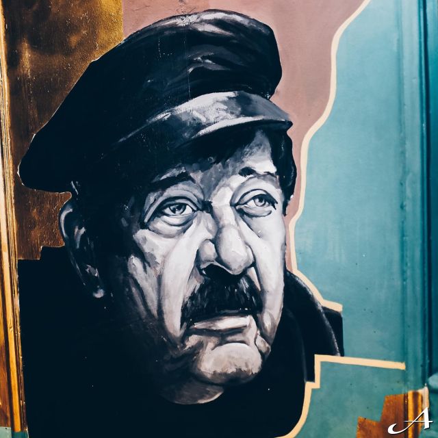 Kafana Druga Kuća - mural lica muškarca